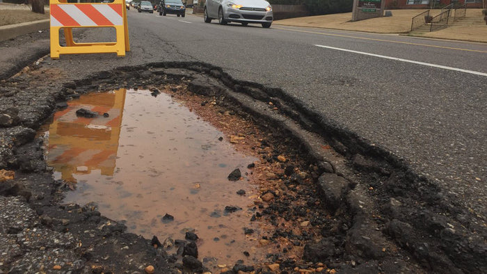 How Potholes Damage Your car